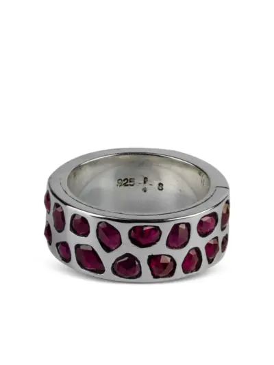 Parts of Four sterling silver Sistema ruby ring