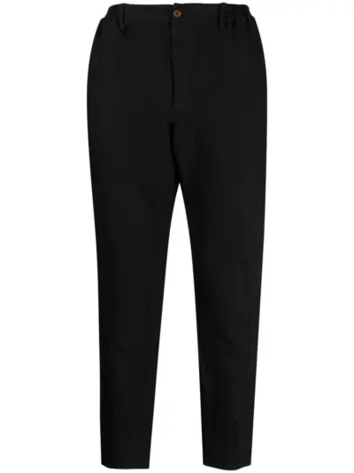 Black Comme Des Garçons chevron-pattern tapered trousers