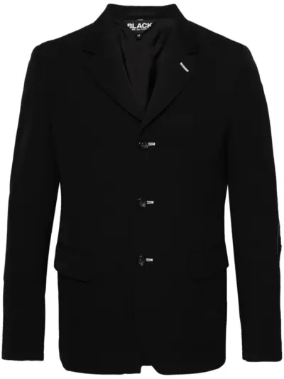 Black Comme Des Garçons ripped wool blazer