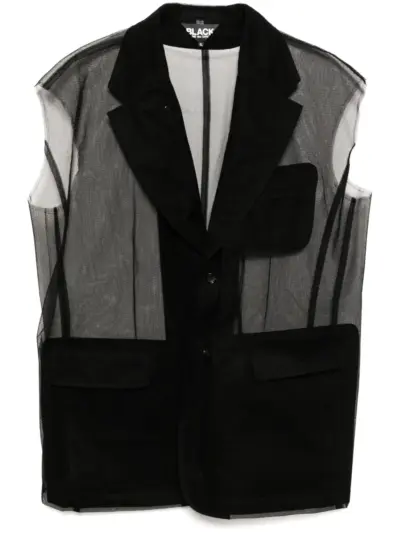 Black Comme Des Garçons sleeveless blazer