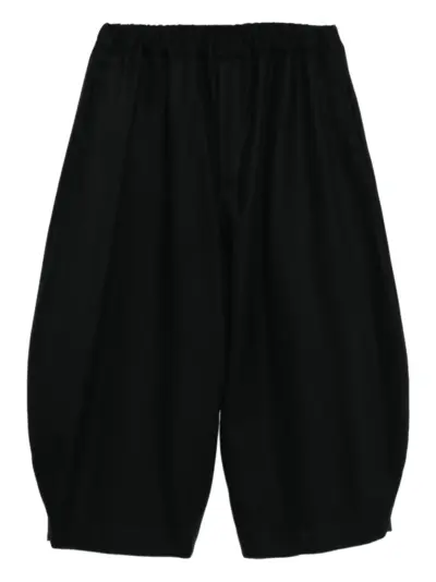 Black Comme Des Garçons cropped tapered trousers