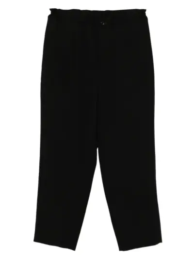 Black Comme Des Garçons wool trousers