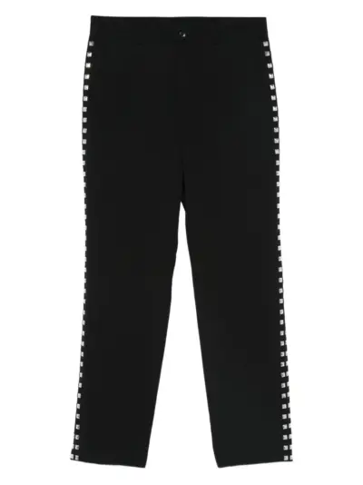 Black Comme Des Garçons wool trousers