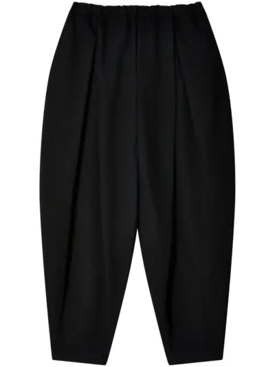 Black Comme Des Garçons tapered-leg trousers