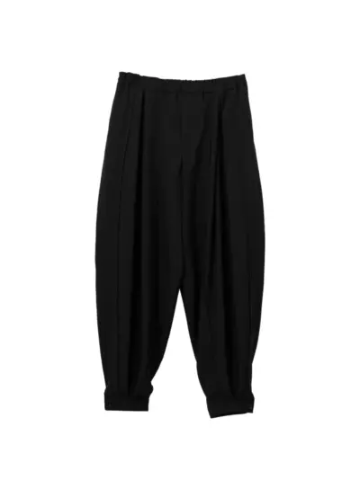 Black Comme Des Garçons pleated trousers