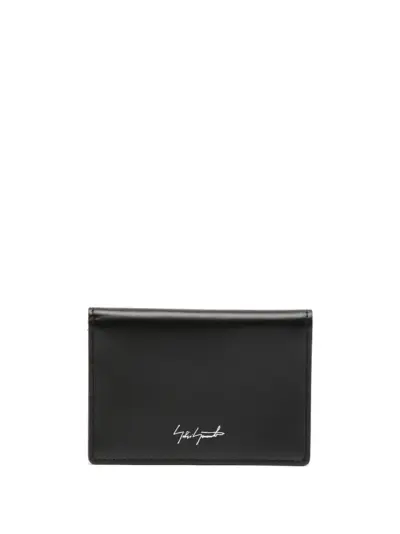 Discord Yohji Yamamoto logo-print bi-fold leather wallet - Black