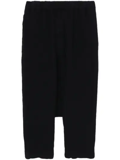 Black Comme Des Garçons drop-crotch cropped trousers