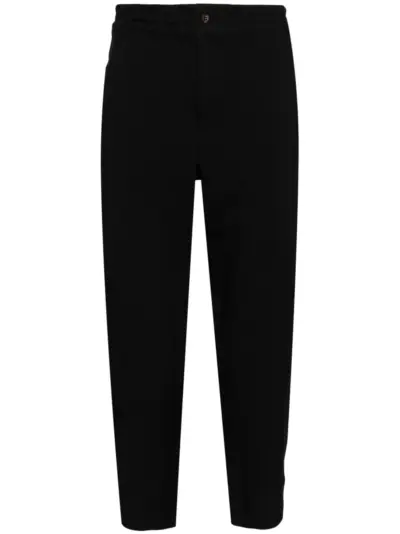 Black Comme Des Garçons elasticated waist cropped trousers