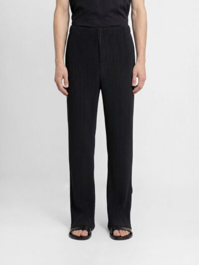 HOMME PLISSE' ISSEY MIYAKE Pants Men color Black