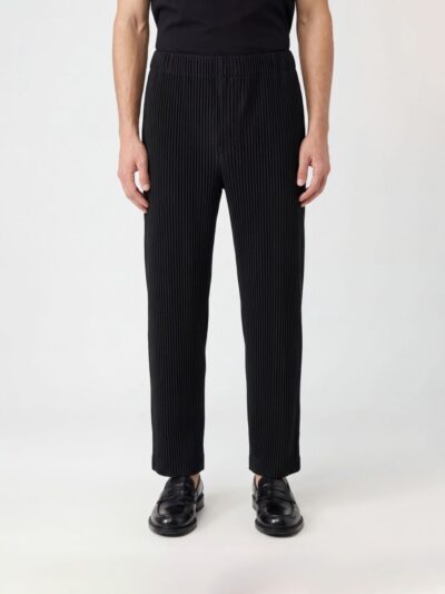 HOMME PLISSE' ISSEY MIYAKE Pants Men color Black