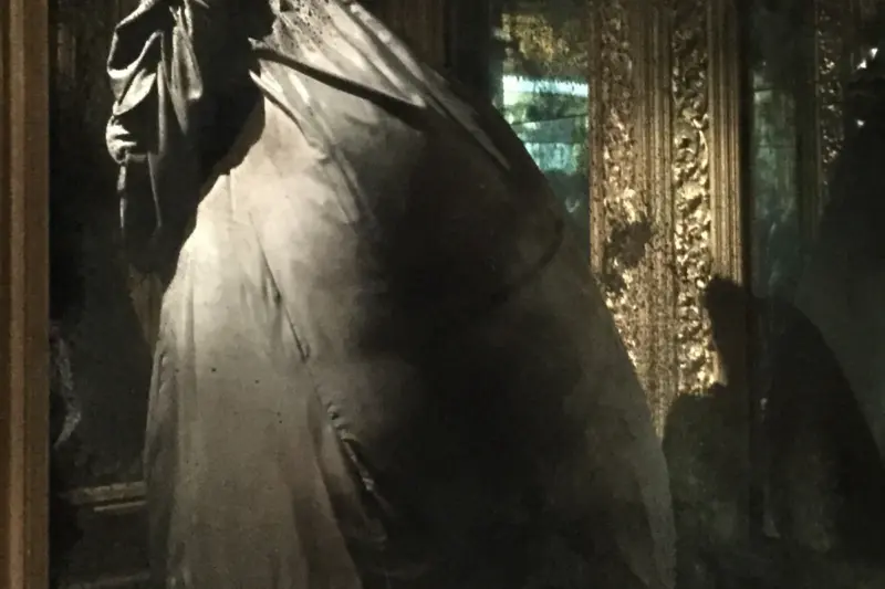 Alexander McQueen voluminous black silk parachute cape from the Supercalifragilisticexpialidocious collection at the Savage Beauty exhibition