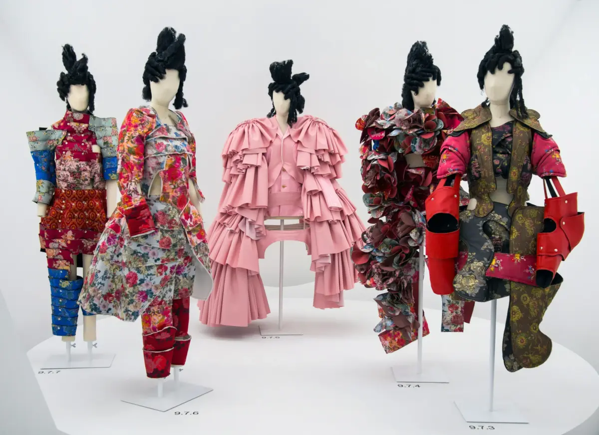 Sculptural black architectural garments by Rei Kawakubo for Comme des Garcons exhibited at The Metropolitan Museum of Art