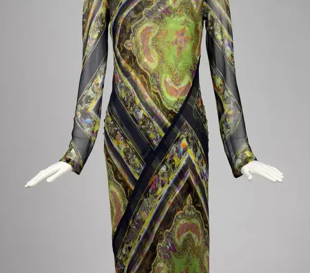 Dries Van Noten 2008 printed silk dress displayed on a mannequin showcasing painterly prints, layering, and artisanal textile work