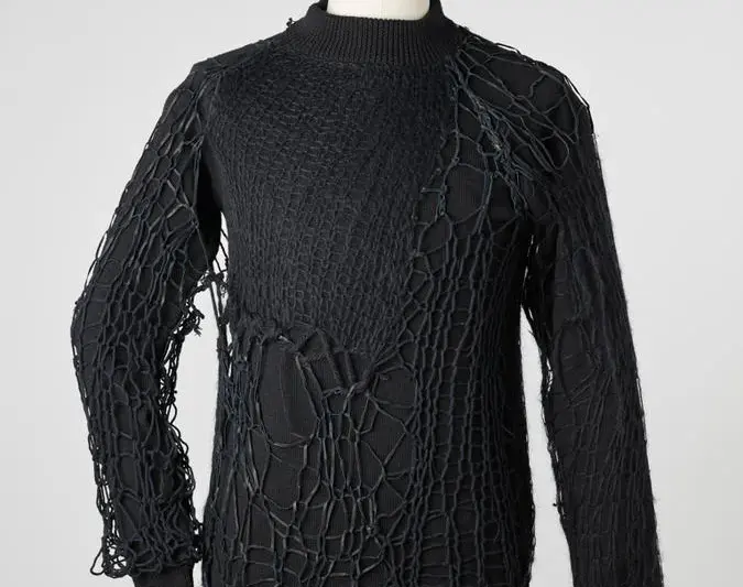 Raf Simons Autumn Winter 1998 Radioactivity spiderweb sweater constructed from handknit cotton leather and mohair over jersey