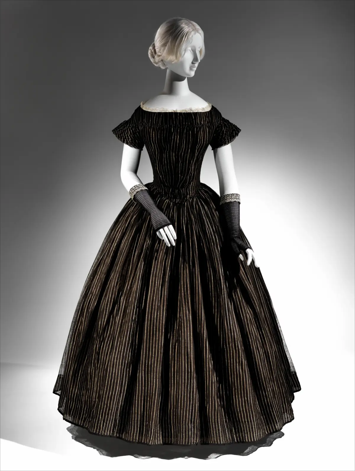 American Victorian mourning dress in matte black silk crepe and faille circa 1870 at The Metropolitan Museum of Art