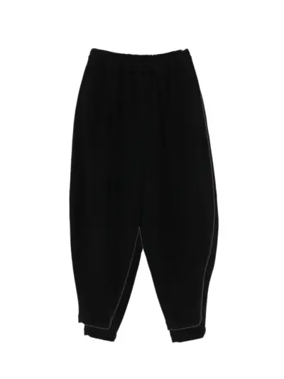 Black Comme Des Garçons elasticated-waist tapered trousers