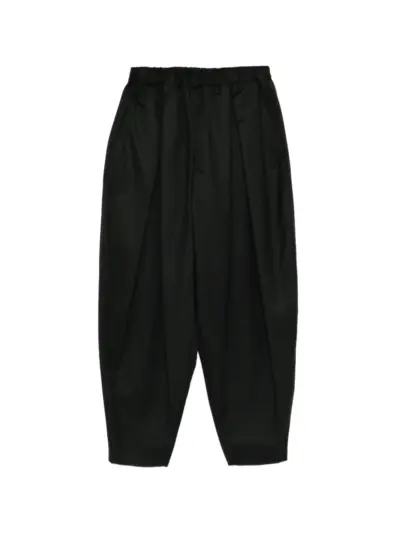 Black Comme Des Garçons pleated trousers