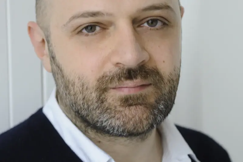 Hussein Chalayan portrait by Chris Moore
