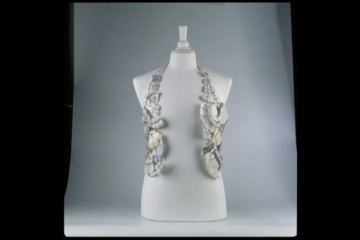 Martin Margiela artisanal broken porcelain plate waistcoat held together by metal wire from Fall Winter 1989-1990