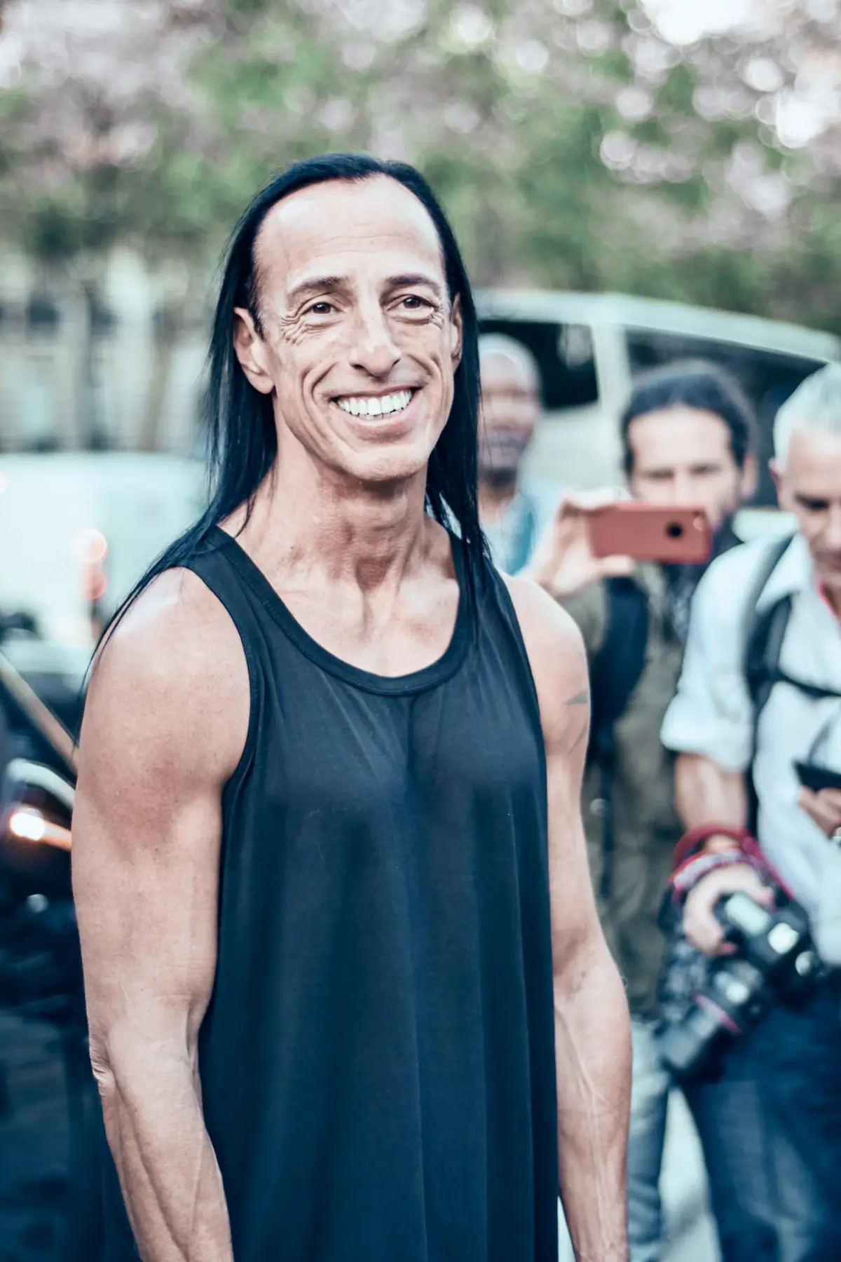 Rick Owens backstage at Paris Fashion Week Spring/Summer 2019 wearing his signature black tank top